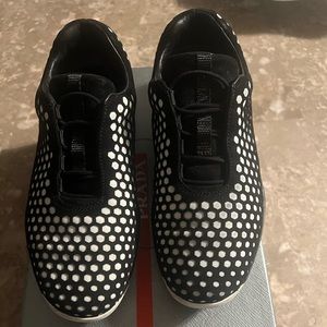 Black and white Prada women’s sneakers.